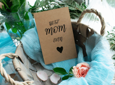 A colorful card that reads "Best Mom Ever" in bold letters, surrounded by decorative hearts and flowers.