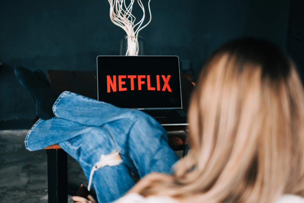 Image showing steps to watch Netflix on a laptop, with tips on getting hired for Netflix viewing opportunities.