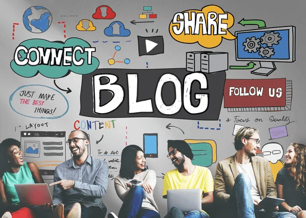 People gathered at a table with "Connect Blog" displayed, engaging in discussions about freelance writing and blogging.