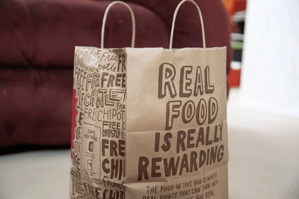 Chick-fil-A's new paper bags promote sustainability, encouraging the use of insulated bags for better food preservation.