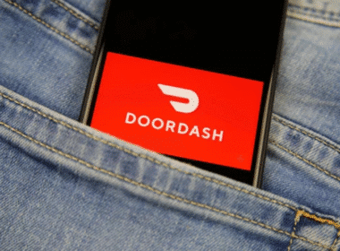 Image of DoorDash app interface, showcasing food delivery options and tips for drivers connecting customers with restaurants.
