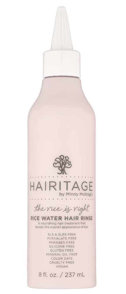 Hairitage water-based conditioner, perfect for DIY scalp rinses, displayed in a modern bottle with a convenient pump.