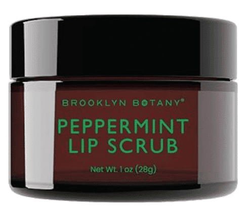 Peppermint lip scrub in a small jar, showcasing a textured, minty product for exfoliating and moisturizing lips.