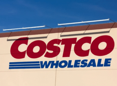 Costco Wholesale sign displayed prominently above a section featuring various freezer meals for sale.