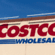 Costco Wholesale sign displayed prominently above a section featuring various freezer meals for sale.