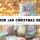 A collection of decorated mason jar Christmas Gifts filled with festive treats, arranged as Christmas gifts on a wooden table.
