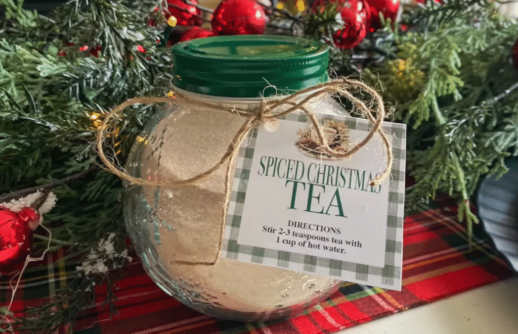 A jar of tea with a label reading "Spiced Christmas Tea," featuring a warm and inviting holiday blend.