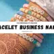 132 personality-packed bracelet business name ideas displayed over colorful handmade beaded bracelets on wrist.