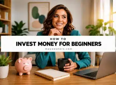 Woman learning how to invest money for beginners with laptop, notebook, and pink piggy bank on desk